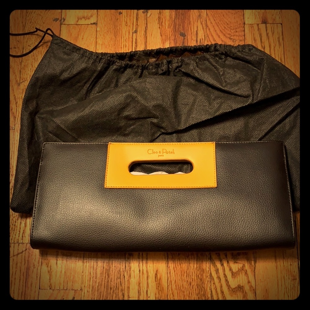 Brand new Cleo and patch Paris clutch